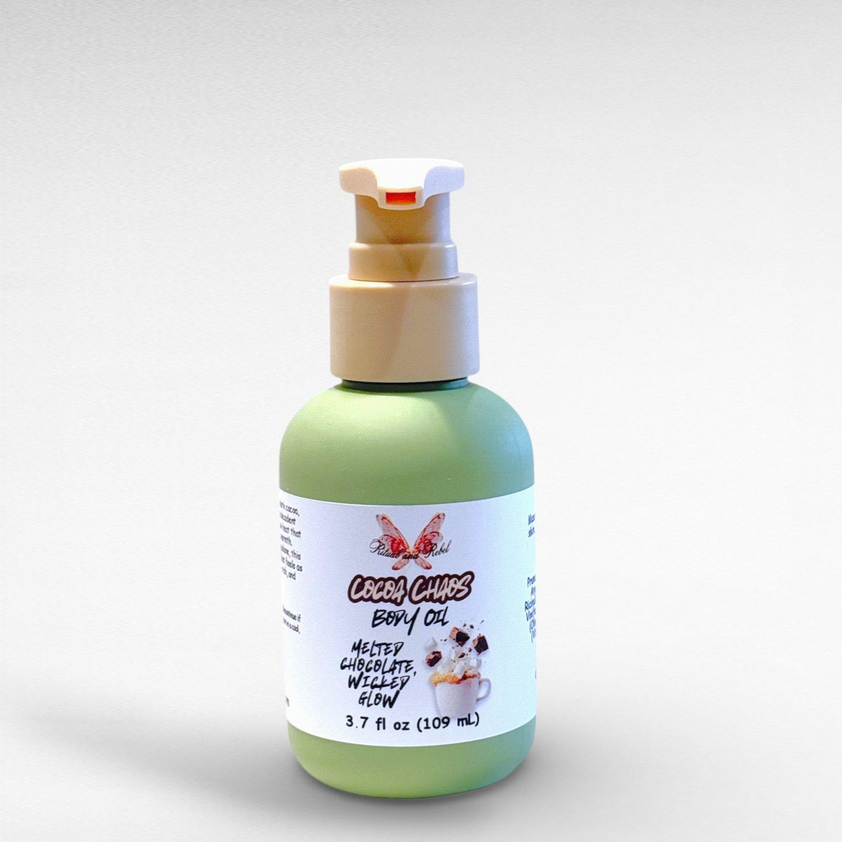 Cocoa Chaos Body Oil by Ritual and Rebel green bottle with pump and label 3.7 fl oz