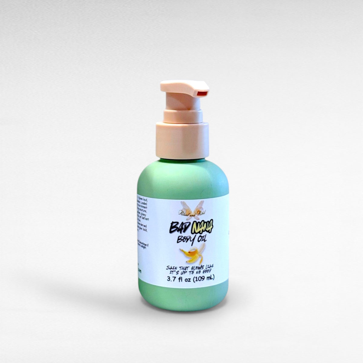 Bad Nana Body Oil by Ritual and Rebel green bottle with beige pump 3.7 fl oz white background