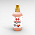 Cherry Mischief Body Oil by Ritual and Rebel pink bottle with beige pump 7.4 fl oz