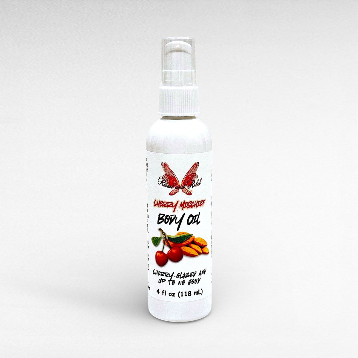 Cherry Mischief Body Oil by Ritual and Rebel white bottle with serum pump 4 fl oz