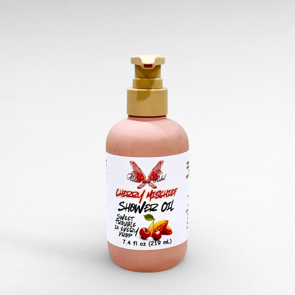 Cherry Mischief Shower Oil by Ritual and Rebel 7.4 fl oz pink bottle with beige pump