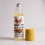 Chocolate Fever Lip Oil by Ritual and Rebel Roll-on lip oil with chocolate flavor Bamboo wood top