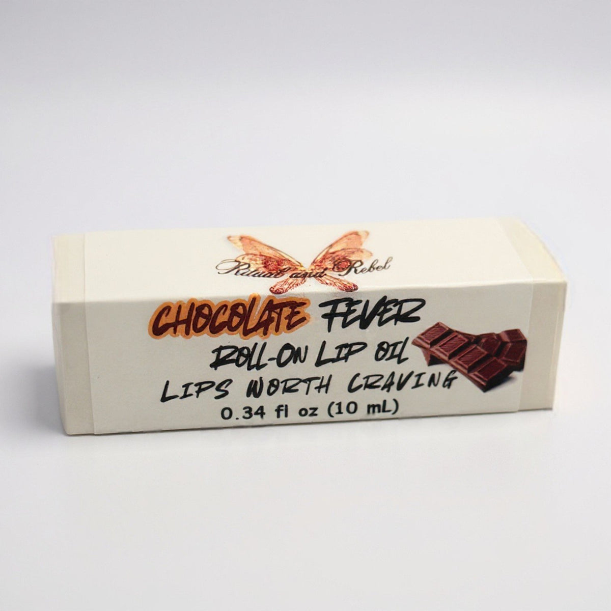 Chocolate Fever roll-on lip oil by ritual and Rebel product Box with a white background