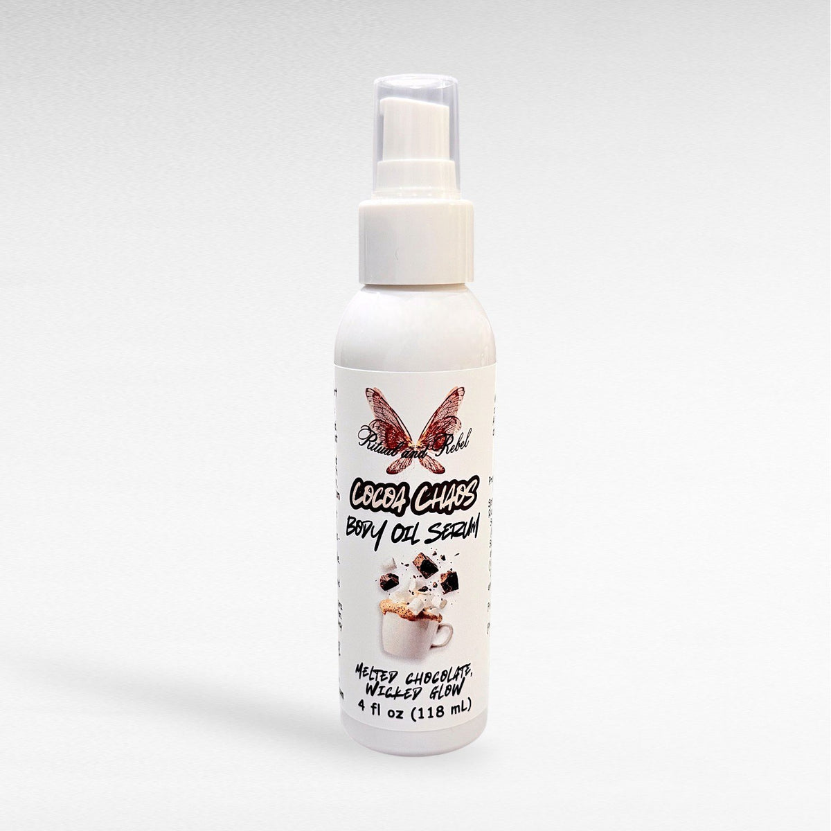 Cocoa Chaos Body Oil by Ritual and Rebel 4 fl oz white tall plastic bottle with serum pump, label and white background