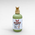Cocoa Chaos Shower Oil by Ritual and Rebel green bottle with beige pump 7.4 fl oz
