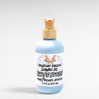 Baby Breath shower oil bottle with a white label on a light gray background 7.4 fl oz