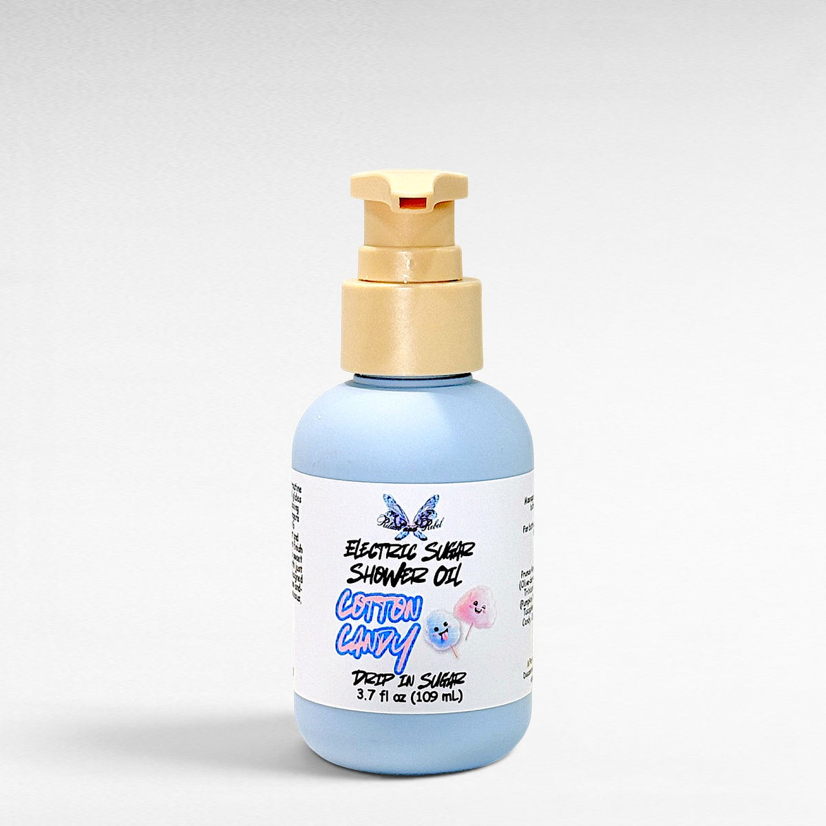 Light Blue Bottle of Electric Sugar Shower Oil by Ritual and Rebel Cotton Candy Scent with a pump on a white background