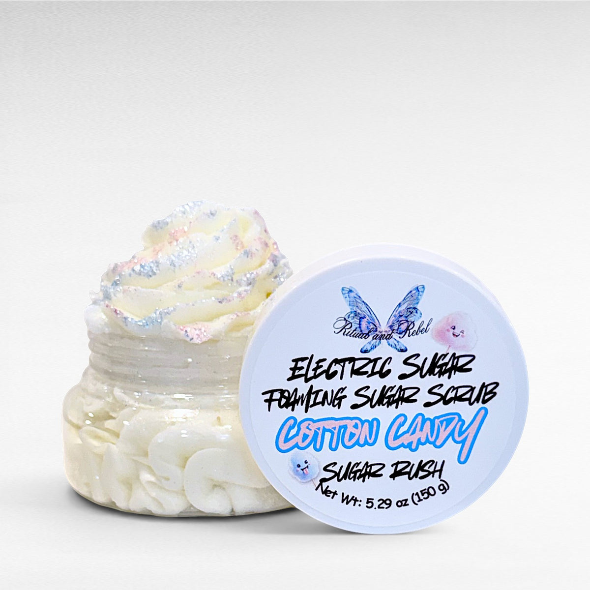 Electric Sugar Foaming Sugar Scrub by Ritual and Rebel body butter in clear plastic jar with white lid  5.29 oz