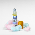 Electric Sugar cotton candy roll-on lip oil by Ritual and Rebel with glossy pink candy-inspired aesthetic on a white background