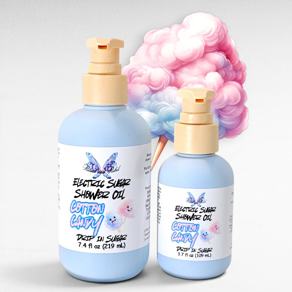 Two bottles of Electric Sugar Shower Oil by Ritual and Rebel with colorful cotton candy-themed design on a light gray background.
