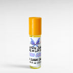Electric Sugar cotton candy roll-on lip oil by Ritual and Rebel with glossy pink candy-inspired aesthetic on a white background, bamboo wood top