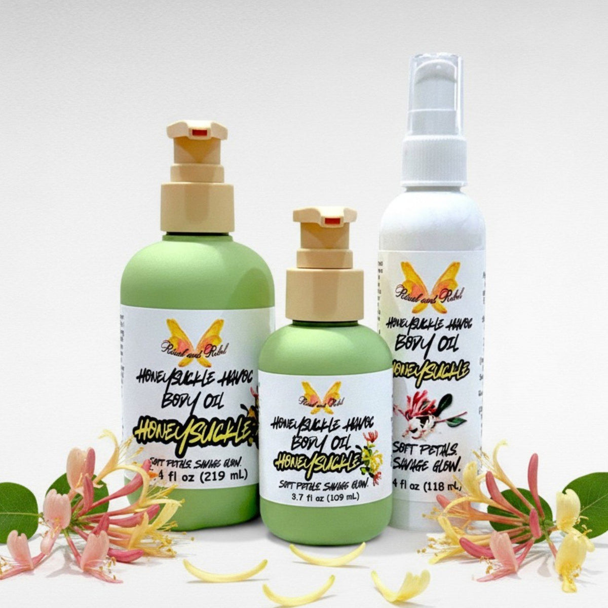 Honeysuckle Havoc Body Oil by Ritual and Rebel 3.7, 4, and 7.4 fl oz bottles green with beige pump and one tall white with serum pump surrounded by honeysuckle flower petals