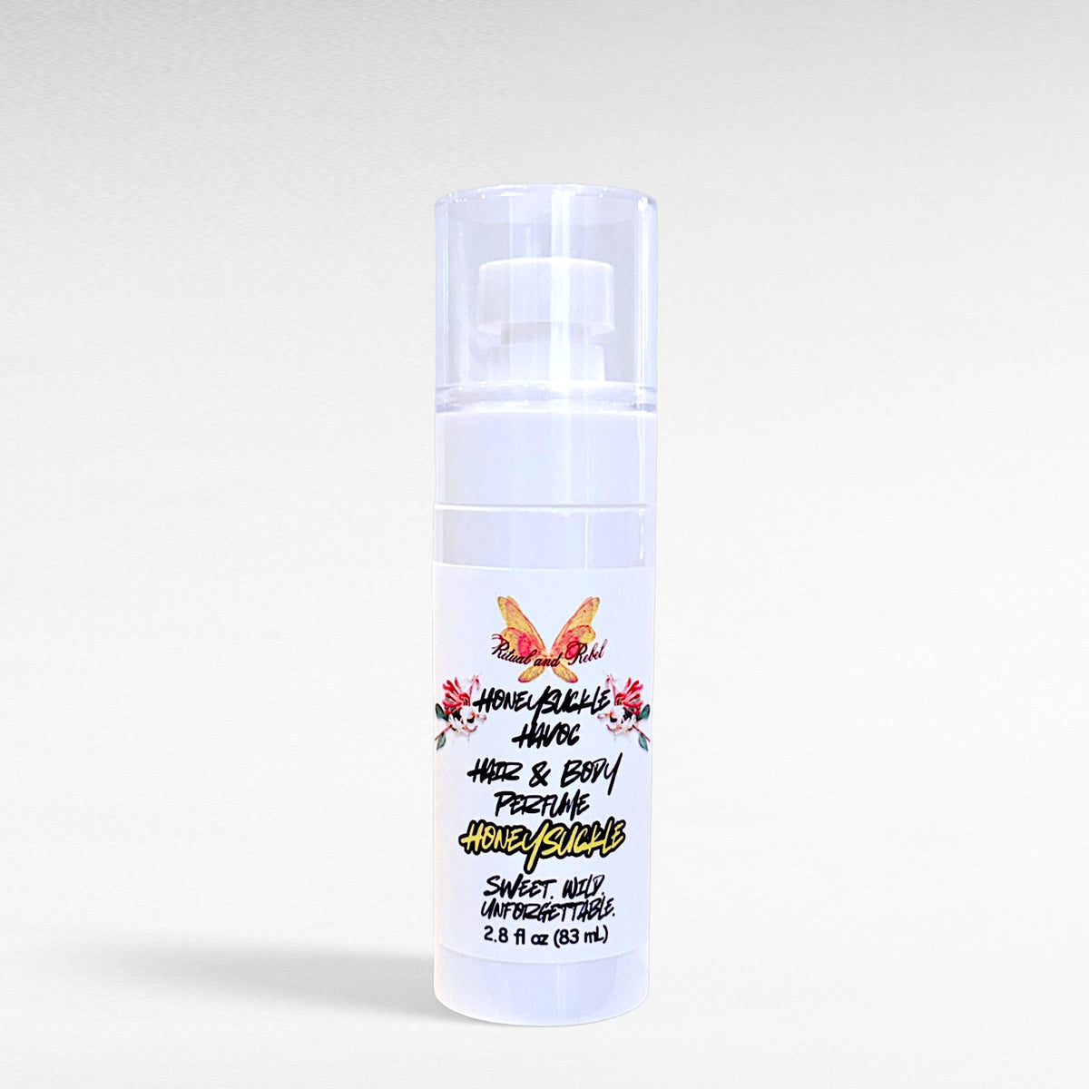 White spray bottle of Honeysuckle Havoc hair and body perfume by Ritual and Rebel. Honeysuckle Havoc 2.8 fl oz 