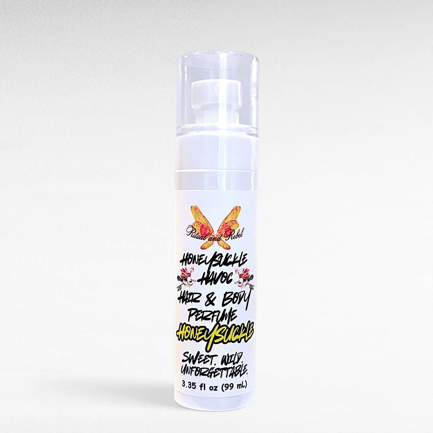 A white pump bottle of Honeysuckle Hair & Body Perfume 'Honeysuckle Havoc' 3.35fl oz with a clear cap, set against a light gray gradient background.