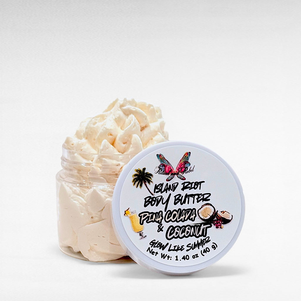 Island Riot Body Butter by Ritual and Rebel Pina Colada and Coconut beige body butter in clear plastic jar with white lid 1.40 oz