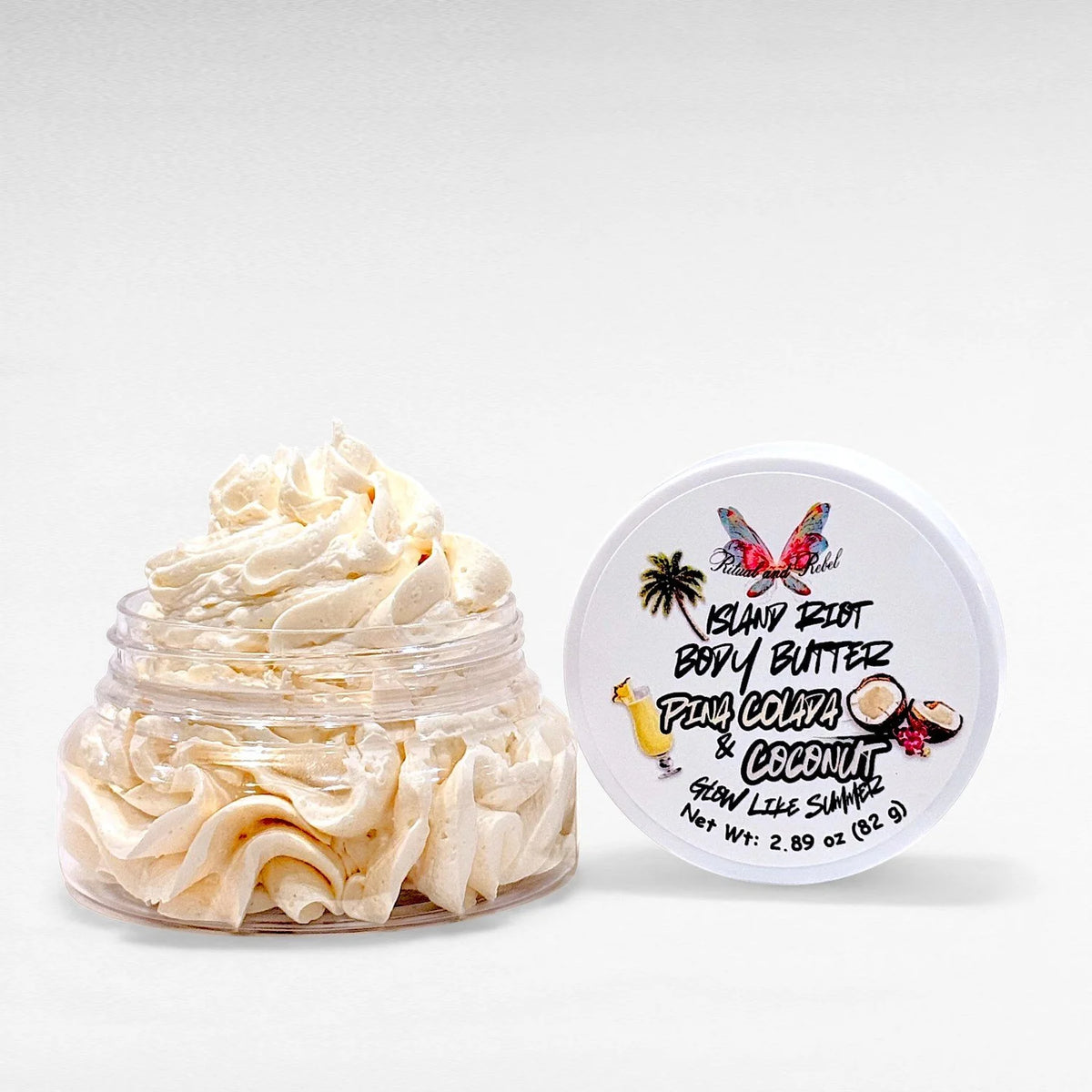 Island Riot Body Butter by Ritual and Rebel  beige whipped body butter in clear plastic jar with white lid 2.89 oz