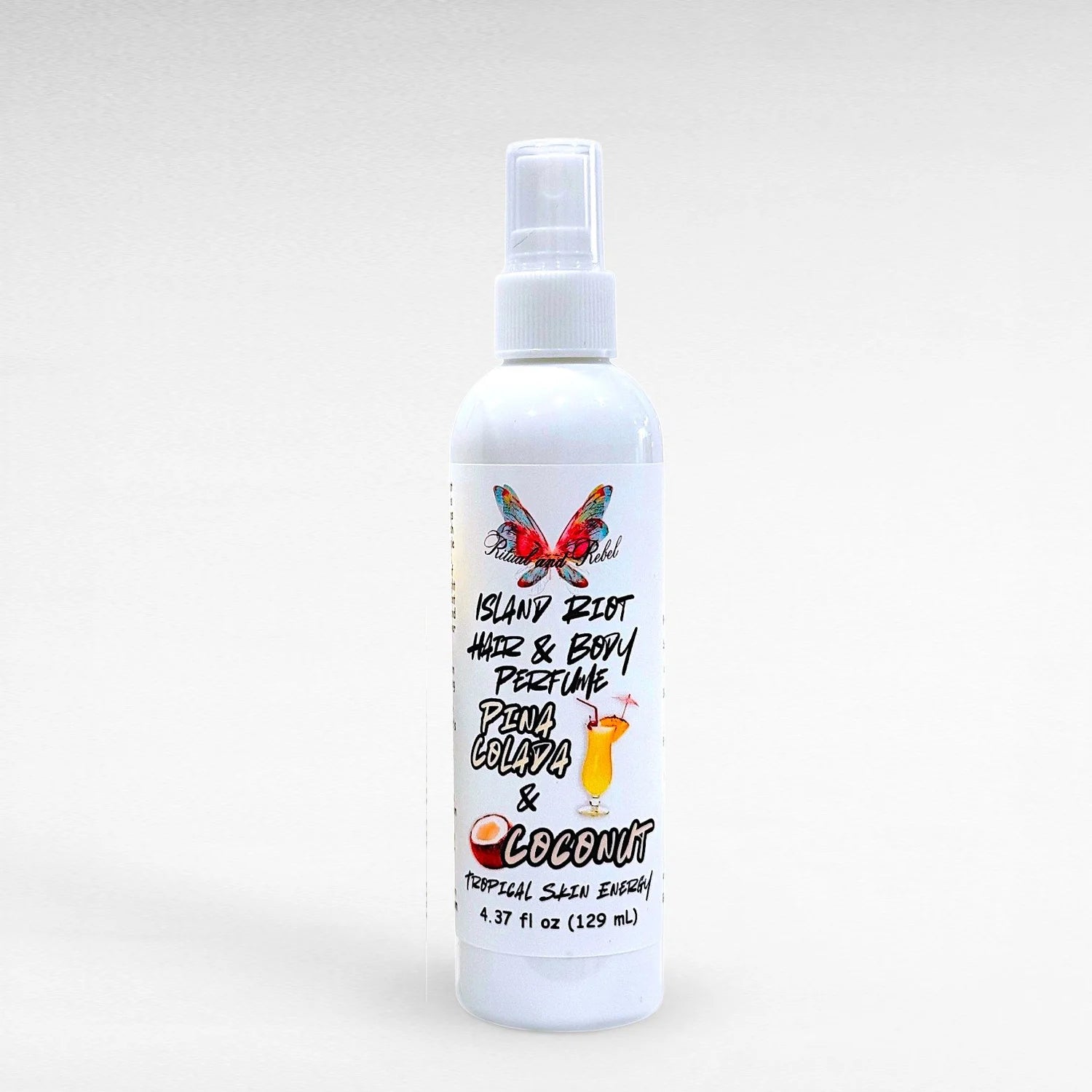 Island Riot Hair & Body Perfume by Ritual and Rebel Pina Colada and coconut white plastic spray bottle 4.37 fl oz