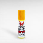 Jungle Juice Roll-On Lip Oil by Ritual and Rebel natural lip oil in glass bottle with bamboo top, fruit punch flavor 10ml
