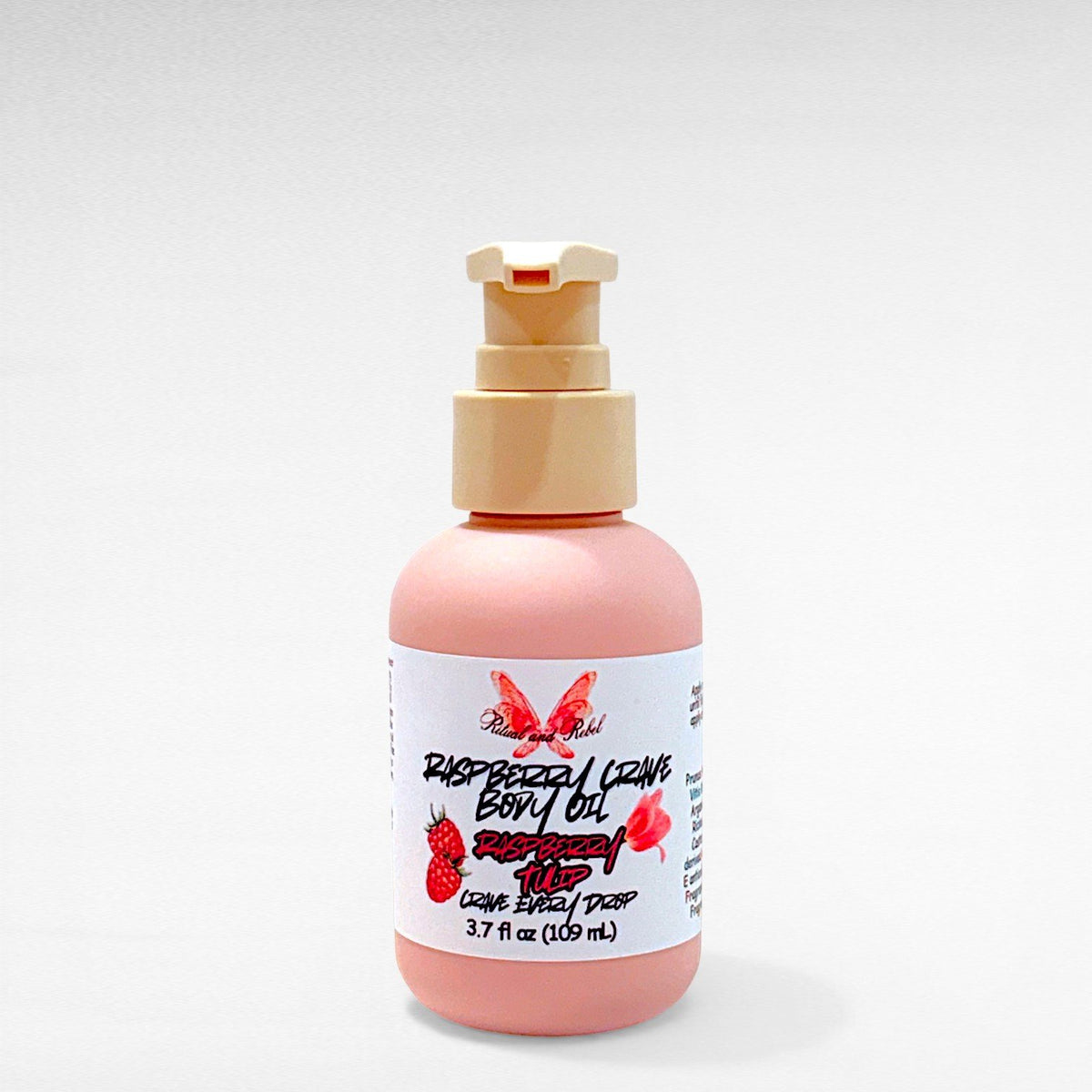 Raspberry Crave Body Oil by Ritual and Rebel 3.7 fl oz pink bottle with pump 