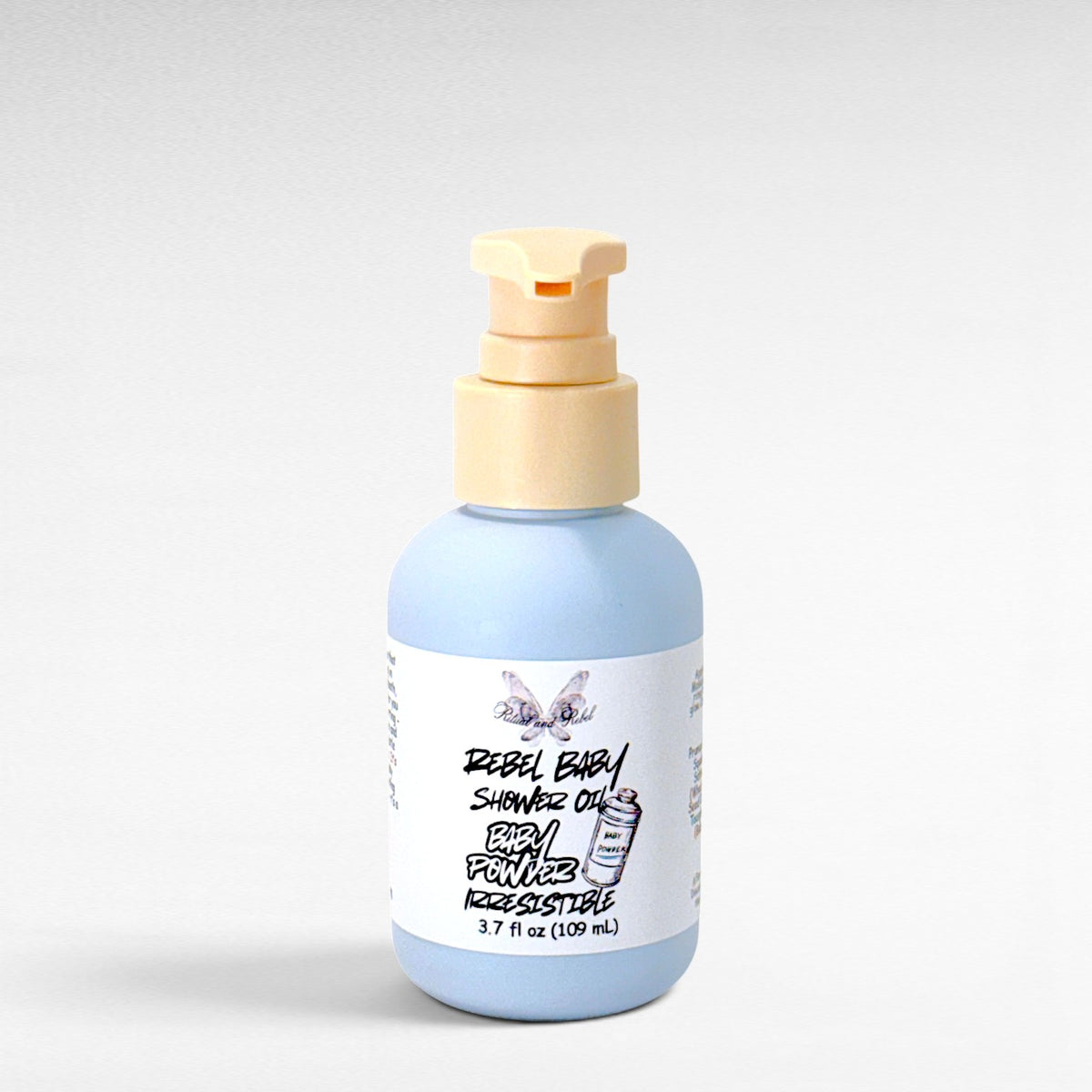 Rebel Baby Shower Oil by Ritual and Rebel light blue bottle with pump 3.7 fl oz light gray background