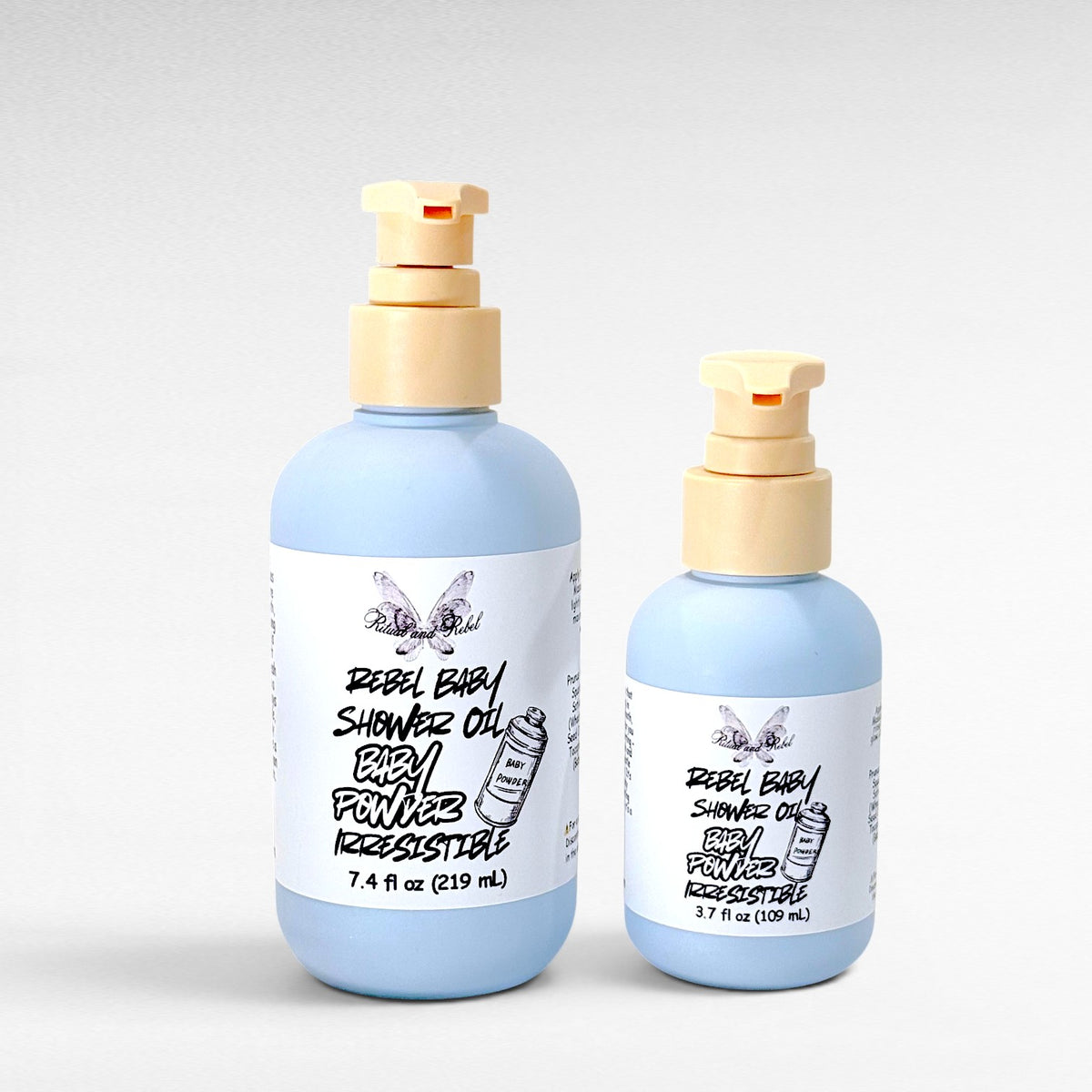 Rebel Baby Shower Oil by Ritual and Rebel light blue bottles with pump 7.4 and 3.7 fl oz light gray background