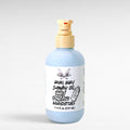 Rebel Baby Shower Oil by Ritual and Rebel light blue bottle with pump 7.4 fl oz light gray background