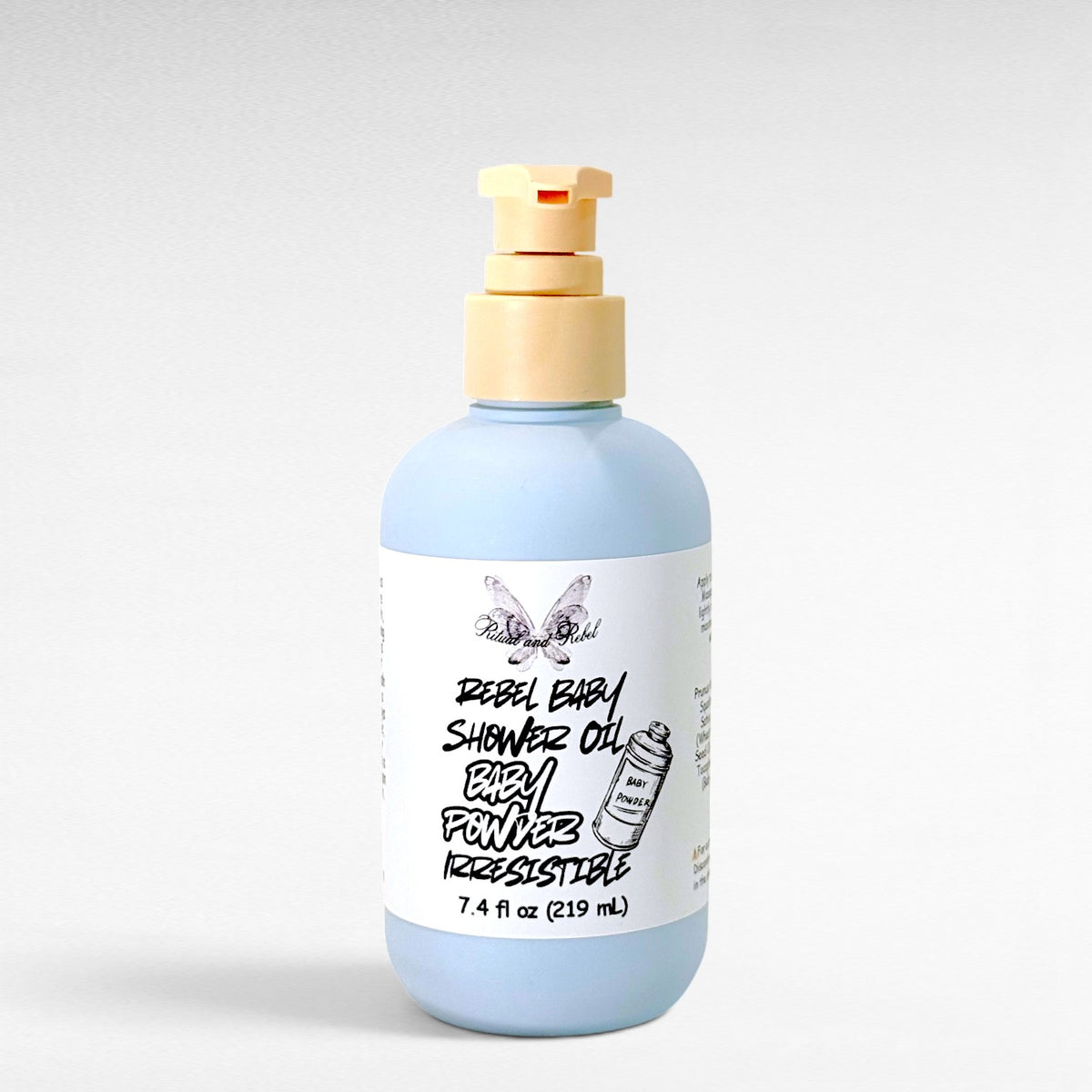 Rebel Baby Shower Oil by Ritual and Rebel light blue bottle with pump 7.4 fl oz light gray background