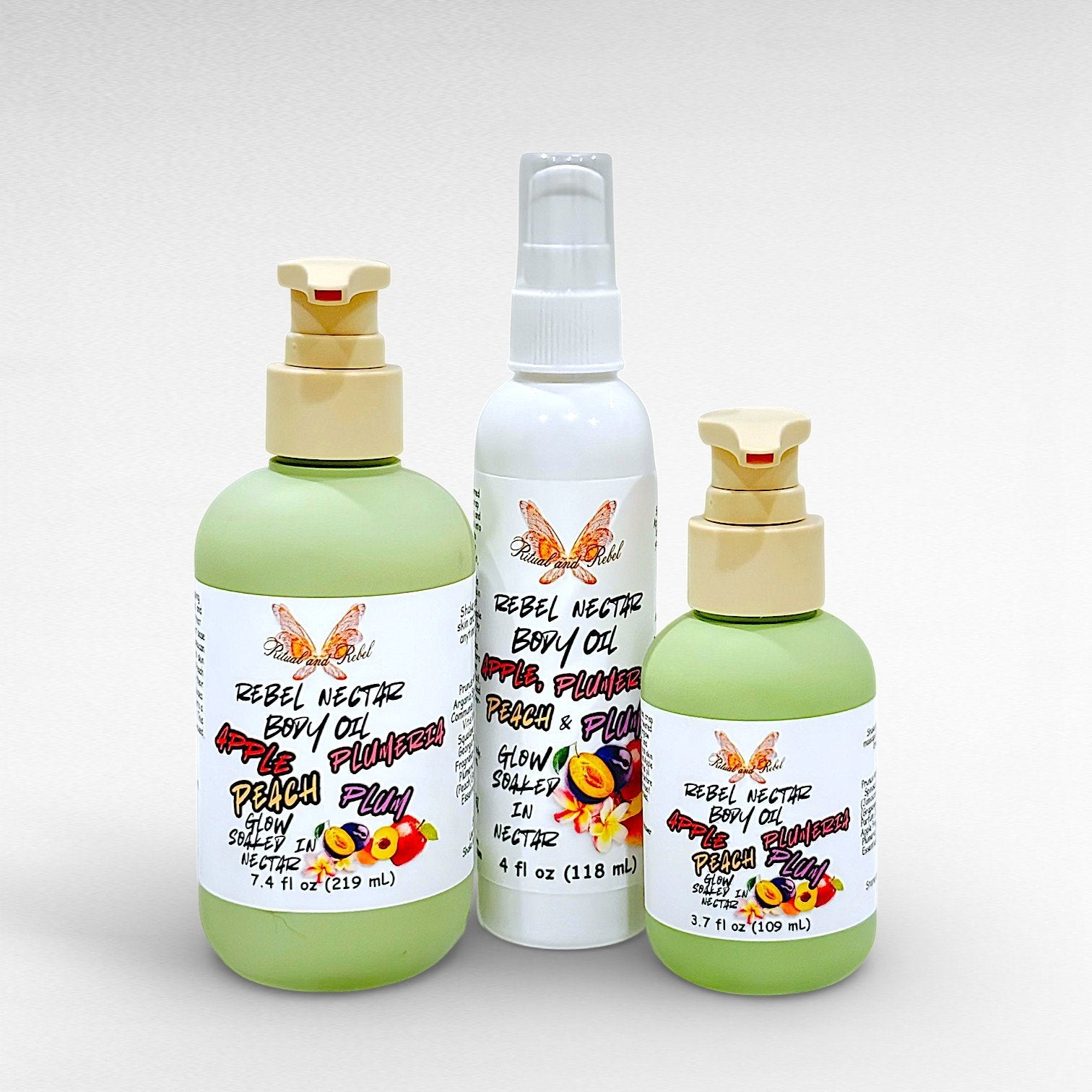 Rebel Nectar Body Oil by Ritual and Rebel 2 green bottles with pumps and one white bottle with serum pump with labels and white background 7.4, 4, and 3.7 fl oz sizes