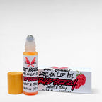 Riot Berry Roll On Lip Oil by Ritual and Rebel glass bottle with metal roll on ball with wood bamboo lid 10 ml with white product box 