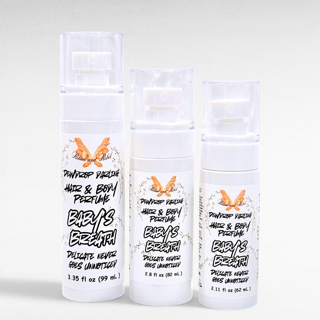 Ritual and Rebel Dewdrop Darling hair and body perfume bottles in three different sizes with white pump dispensers.