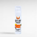 Ritual and Rebel Golden Hour Hair and Body Perfume in a white spray bottle with a classic suntan scent label.