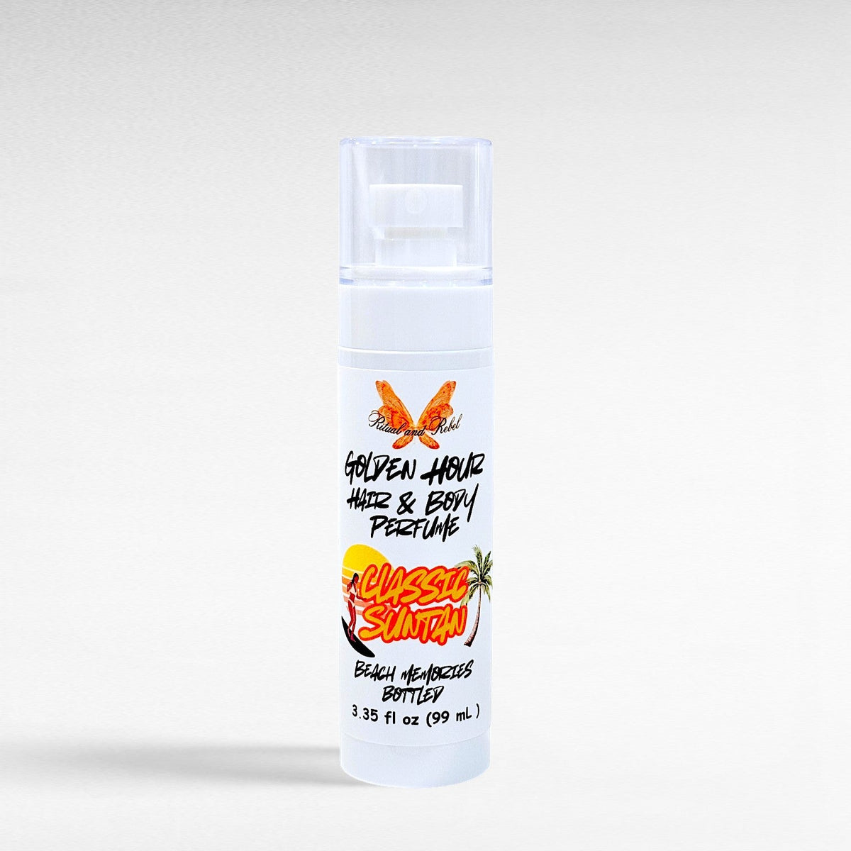 Ritual and Rebel Golden Hour Hair and Body Perfume in a white spray bottle with a classic suntan scent label.