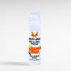 Ritual and Rebel Golden Hour Hair and Body Perfume in a white spray bottle with a classic suntan scent label.