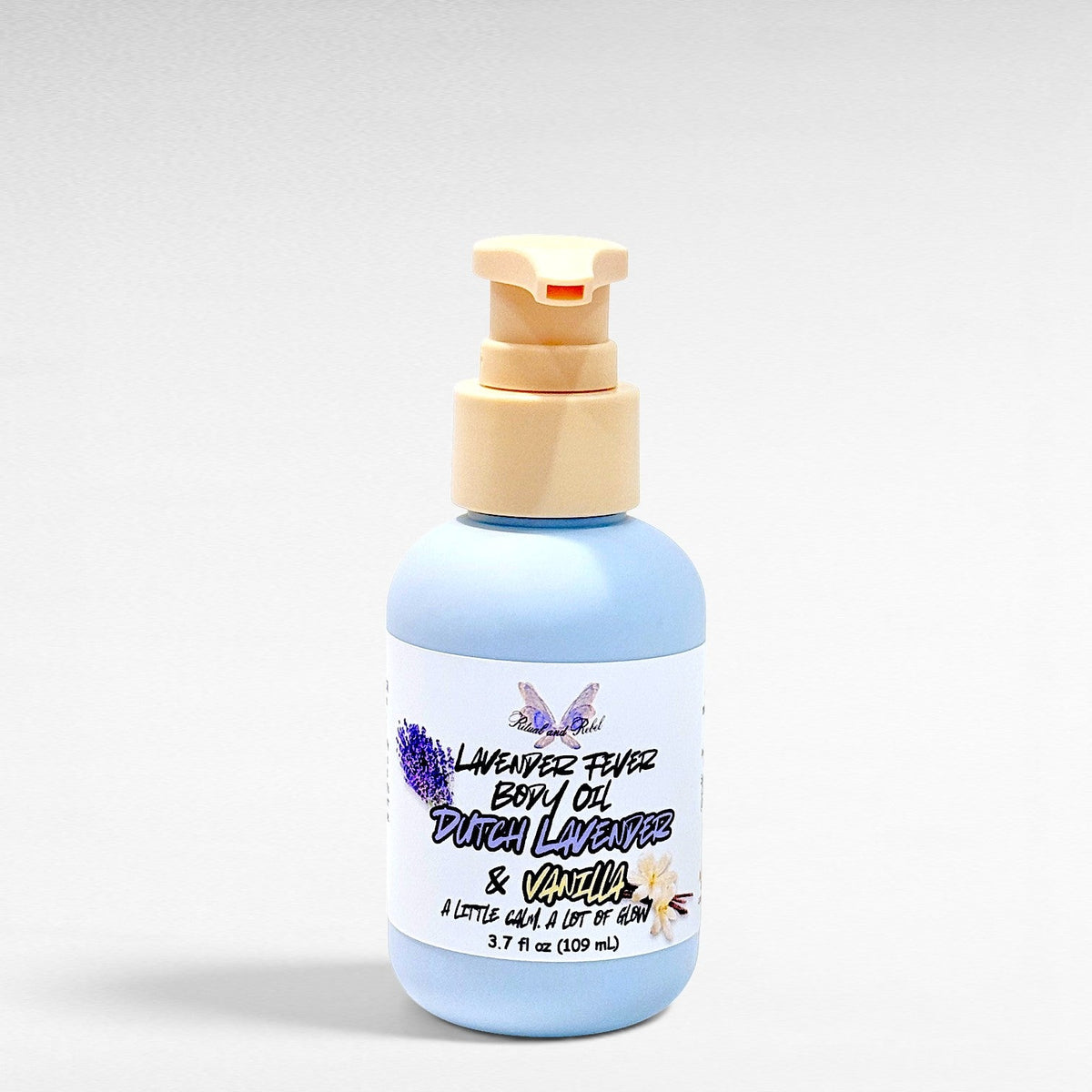 Ritual and Rebel Lavender Fever body oil in a light blue pump bottle with Dutch lavender and vanilla scent.