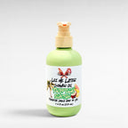Ritual and Rebel Lei Me Later Shower Oil in a light green bottle with a pump dispenser and tropical label design.