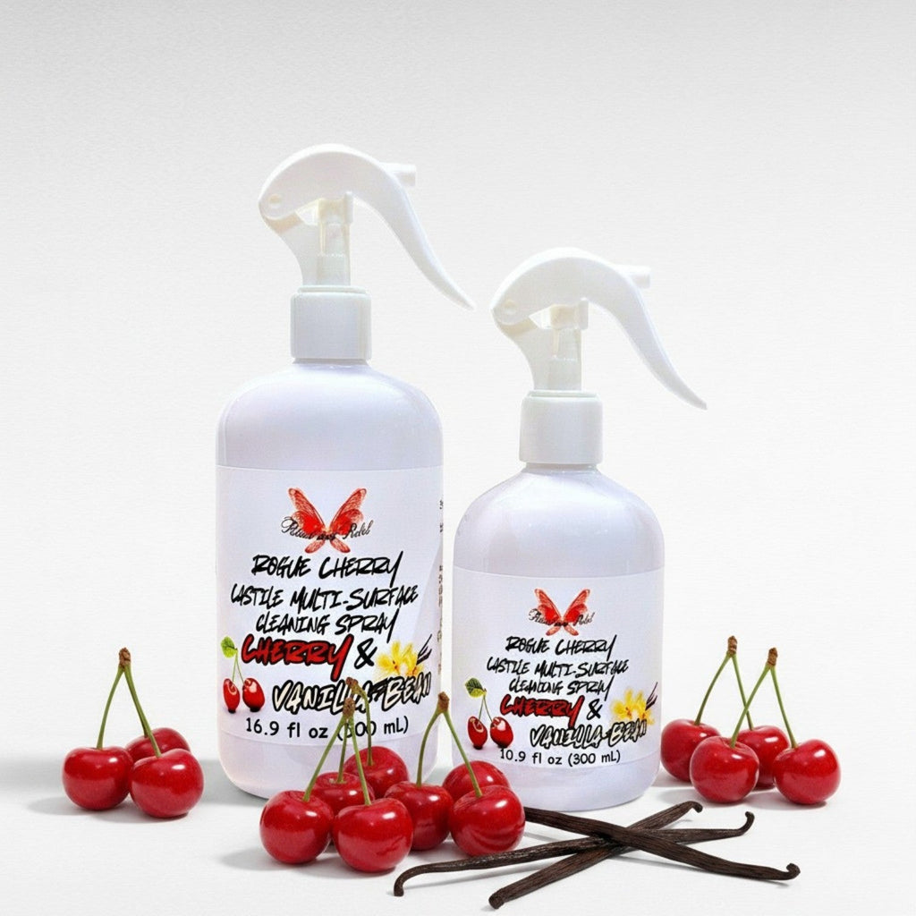 Ritual and Rebel Rogue Cherry Castile multi-surface cleaning spray bottles with fresh cherries and vanilla beans.
