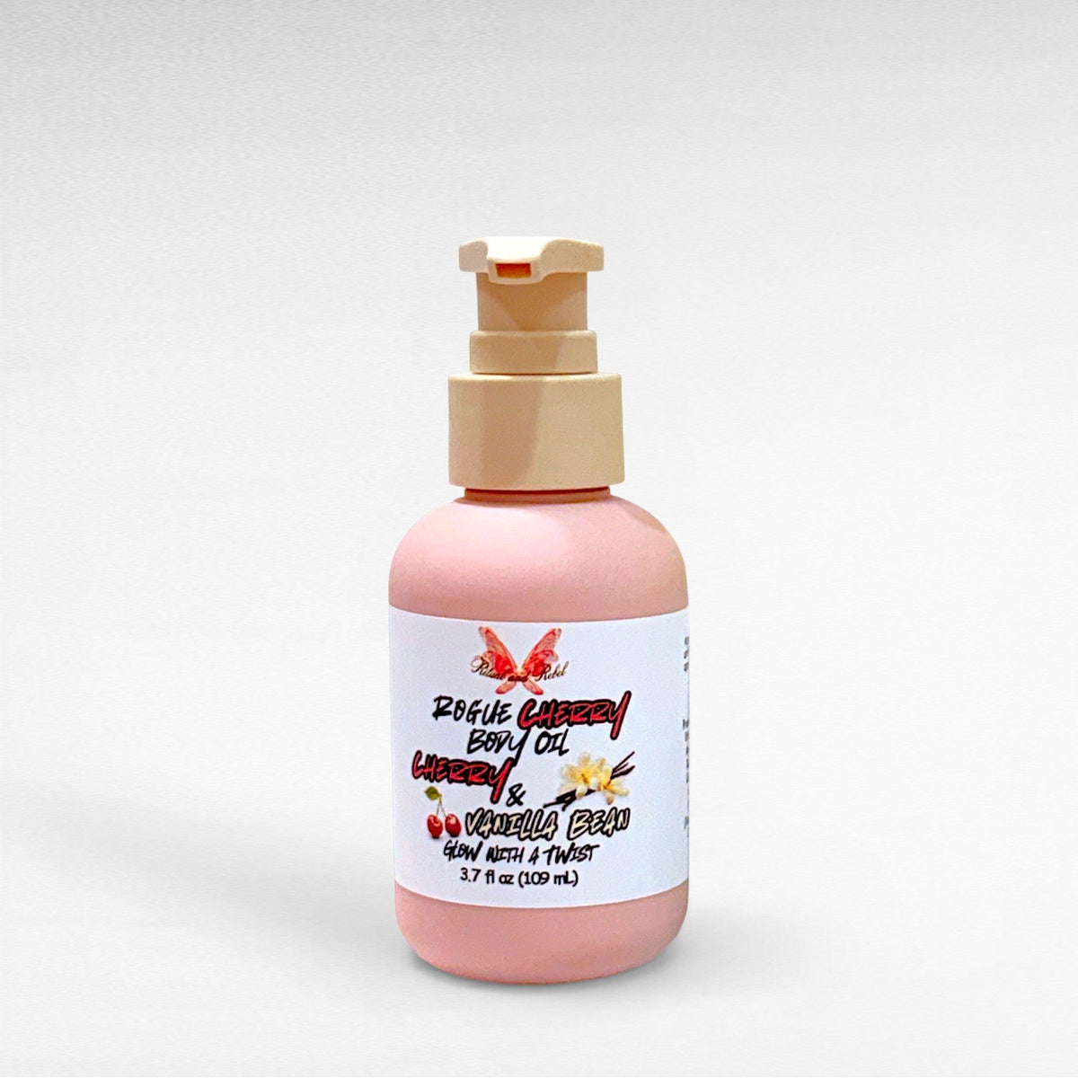 Rogue Cherry Body Oil by Ritual and Rebel  pink bottle with beige pump 3.7 fl oz