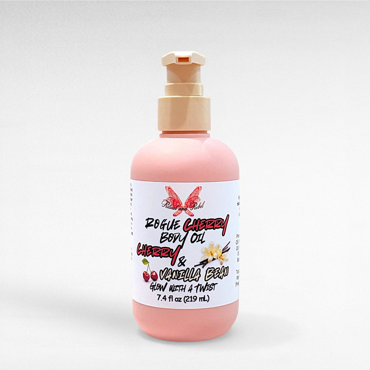 Rogue Cherry Body Oil by Ritual and Rebel pink bottle with beige pump 7.4 fl oz