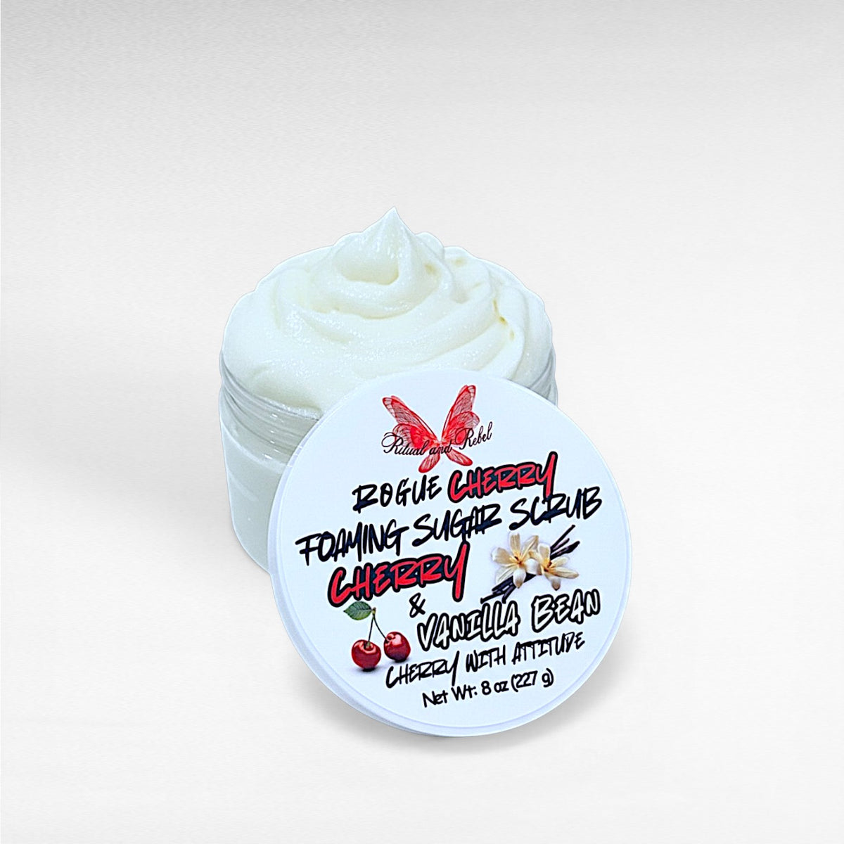 Rogue Cherry Foaming Sugar Scrub by Ritual and Rebel white scrub in clear jar with white lid with label 8oz