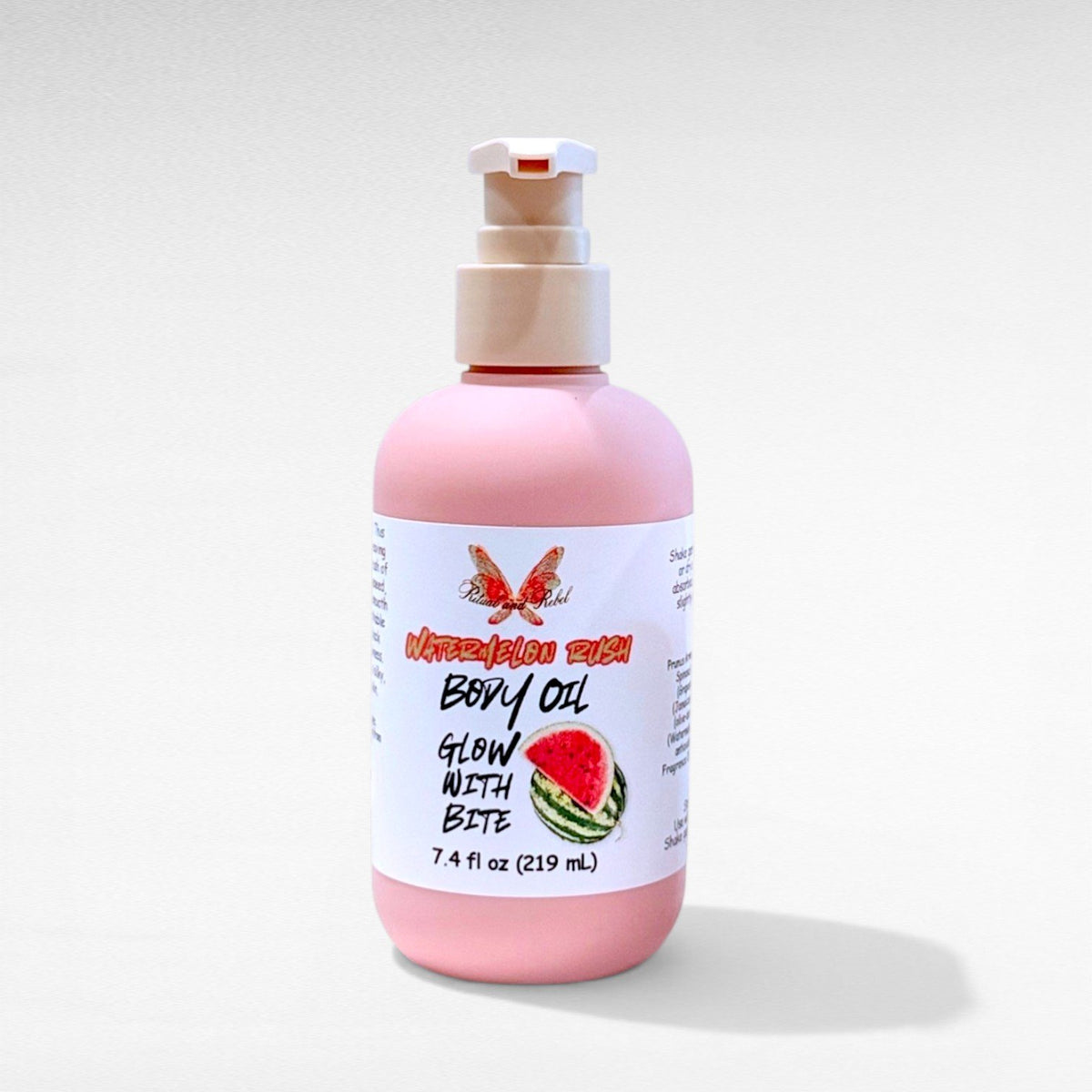 Watermelon Rush Body Oil by Ritual and Rebel pink bottle with beige pump 7.4 fl oz
