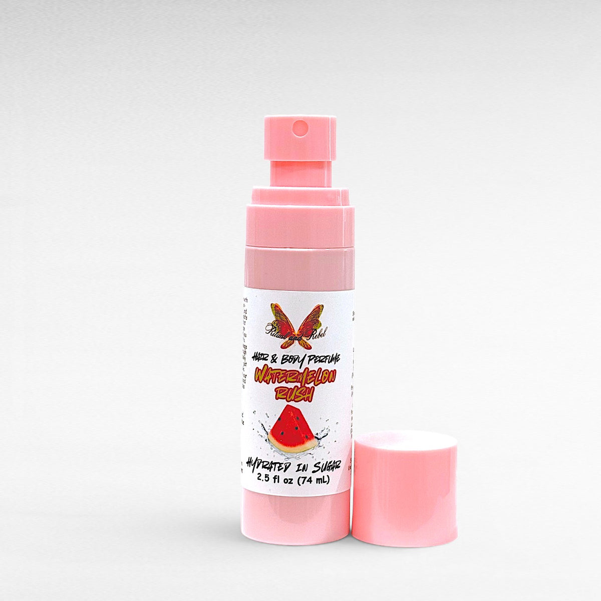 Watermelon Rush Hair & Body Perfume by Ritual and Rebel 2.5 fl oz pink spray bottle with pink cap
