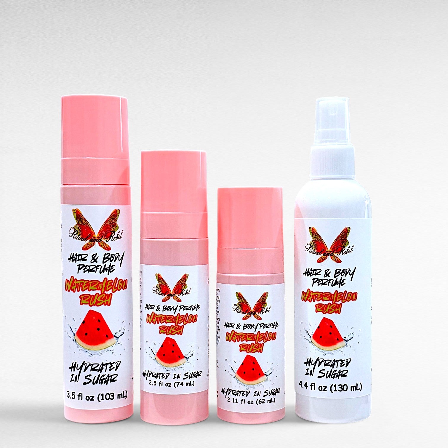 Watermelon Rush Hair & Body Perfume by Ritual and Rebel 3 pink bottles and 1 white bottle sprays