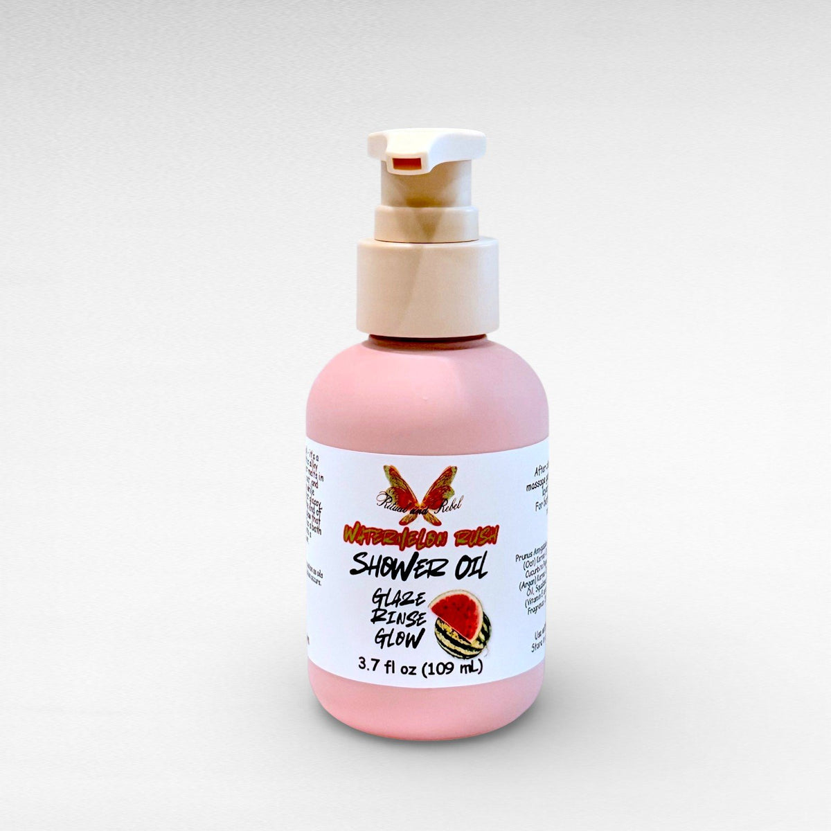 Watermelon Rush Shower Oil by Ritual and Rebel pink bottle with beige pump 3.7 fl oz